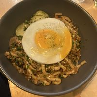 Yaki udon noodles with fake egg that smelled a lot like a real egg! (Made w rice flour, sweet potato and carrots)  at Kind Kitchen in Porto