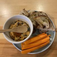 Hummus, sour dough and carrot crudités  at Kind Kitchen in Porto