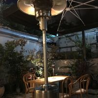 Heat lamps in the garden at TeDuKtu in Tirana