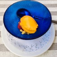 Sea buckthorn sorbet on fresh grapefruit and mangoe at MythenForum in Schwyz