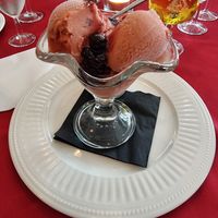 Strawberry sorbet icecream with warm cherries at Ponderosa in Assen