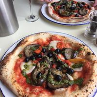 Aubergine, peppers and olives pizza at PLY in Manchester