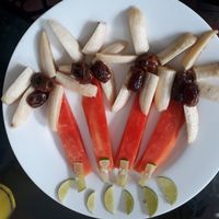 Palm trees fruit plates at Susu Vegan Kitchen in Unawatuna