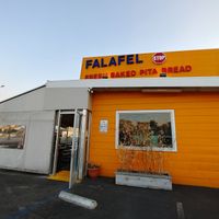 Front: about 10 parking stalls in the parking lot. at Falafel Stop in Sunnyvale