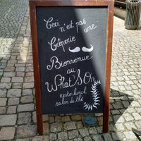 the sign outside at What's On in Quimper
