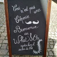 sign outside at What's On in Quimper