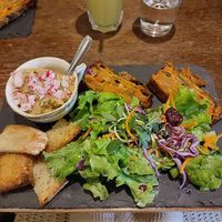 Vegetable terrine with herby houmous and salad at Petit Biscuit Et Gourmandise in Puy-leveque
