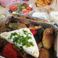 Briami with vegan feta, french fries with vegan mayo, vegan salad with vegan tzatziki at Griekse Taverna Doris in Groningen