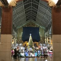 Xmas in València-Suc de Lluna is on the left as you enter the market from this entrance.  at Suc de Lluna BioCafe in Valencia