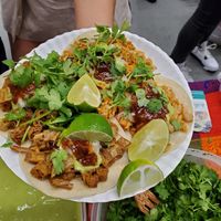 Fresh avocado salsa, limes, tomato salsa, fried yellow peppers, onions and chile de árbol salsa topping bar 🙌  at La Chancita in San Francisco