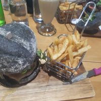 Falafel burger with fries at The Healthy Hub Cafe in Cairns