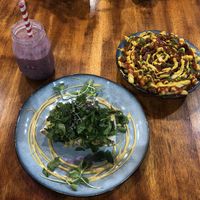 Mixed berry smoothie, mush fu & loaded fries at The Healthy Hub Cafe in Cairns