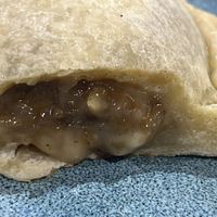 Mushroom empanada. Really good. And filling!!  at The Healthy Hub Cafe in Cairns