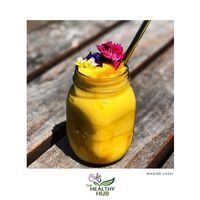 Mango Lassi Smoothie - organic mango, fresh coconut milk & coconut nectar 👌 at The Healthy Hub Cafe in Cairns