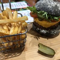 Beyond burger with charcoal bun at The Healthy Hub Cafe in Cairns
