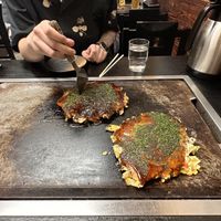 Left vegan on the right vegetarian okonomiyaki  at Okonomiyaki Chitose in Osaka