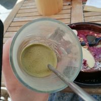 Matcha latte with soy milk, agave on the side to sweeten it to your liking. Big glass!! at Mahalo in Groningen