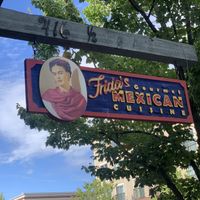 Sign outside with patio dinning  at Frida's Gourmet Mexican Cuisine in Anacortes