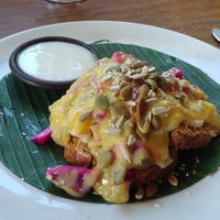 Banana peanut bread with fruit toppings and coconut yoghurt at Bali Buda in Ungasan