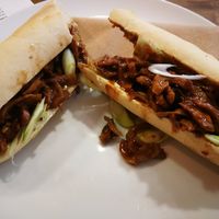 Hoisin duck baguette, with lettuce and spring onions at Aubergine in Cardiff