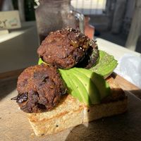 Avo toast with eggplant veggie balls  at Painapol in Holbox