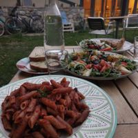 In front the vegan pasta I had. With a spicy sauce of black olives.  Mouth watering. at Vita Organica Slow Food & Liv (-ing) in Busturia