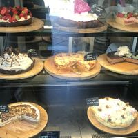 Vegan options are visibly marked with green dots on the signs  at AmaZone Cafe in Moliets