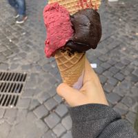 Vegan cone (along with the conny topping) and 2 balls of vegan ice cream flavours: mix of berries and dark chocolate at Gelato Artigianali in Rome