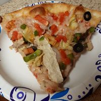 Added artichoke and chick'n strips to the Vegan Veggie Soy Deluxe pizza at Beach Bella Pizza II in Virginia Beach