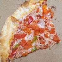 Pizza with soy cheese, tomato, red and green pepper, and onion. Not pictured: about 20-30 olive slices that were incorrectly put on the pizza and had to be removed. at Beach Bella Pizza II in Virginia Beach