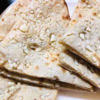 You can choose garlic roti  at Newdelhi Indian in Kyoto