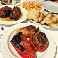 Stuffed veggies, bread, fries at Onhezmi in Sarande