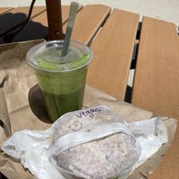 Vegan breakfast sandwich: everything bagel, egg, sausage, cheese, avocado (green smoothie from another shop)  at Shmagels Bagels in Ocean City