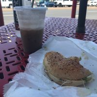 Everything bagel with hummus, spouts and avocado. Mocha latte with almond milk.  at Shmagels Bagels in Ocean City