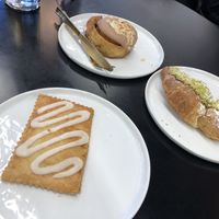 Apple pie pop tart, almond baileys cinnamon roll, pistachio croissant  at Canela in Calgary