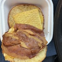 Breakfast sandwich w/ bacon, cheese & egg  at Canela in Calgary