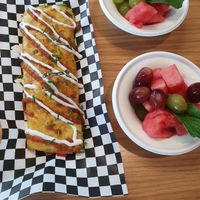 Vegan omelette and fresh fruit at Spoiled Vegans Cafe in San Diego