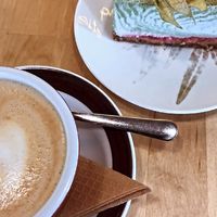 Cappuccino with oat milk and matcha rhubarb cake. at Rohe in Tallinn