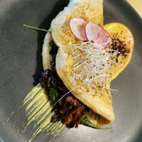 nomlette filled with mushrooms, spinach, bell pepper and grilled zucchini at Rohe in Tallinn