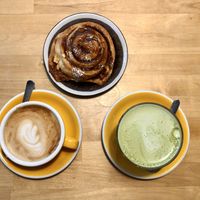 cinnamon bun, coffee and matcha  at Rohe in Tallinn