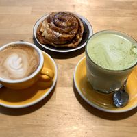 cinnamon bun, coffee and matcha  at Rohe in Tallinn