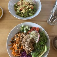 Pesto pasta and chicken sushi rice dish  at Rohe in Tallinn