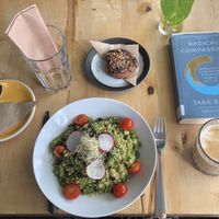 Pesto pasta, chocolate peanut cookie and an oat milk latte  at Rohe in Tallinn