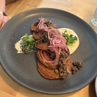 Savoury pancakes with mushrooms and cream on topp  at Rohe in Tallinn
