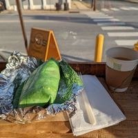 Breakfast burrito and latte at Jus Organic in Highlands