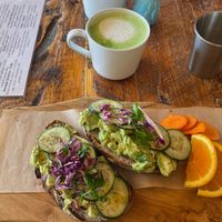 Avocado Tartine with a plant milk matcha latte at Jus Organic in Highlands