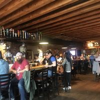 Inside bar. But lots of tables / booths available too   at Three Dollar Deweys in Portland