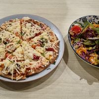 Pizza, size compared to knife. at Noosa Reef Hotel in Noosa Heads