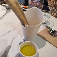 Bread stick with olive oil at elemen Classic 元素 . 经典 - Great World City in Central Singapore