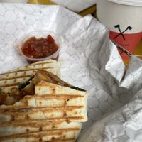 Vegan grilled burrito, and almond - coconut milk … delicious , fast friendly service.   at Honest Coffee Roasters in Franklin